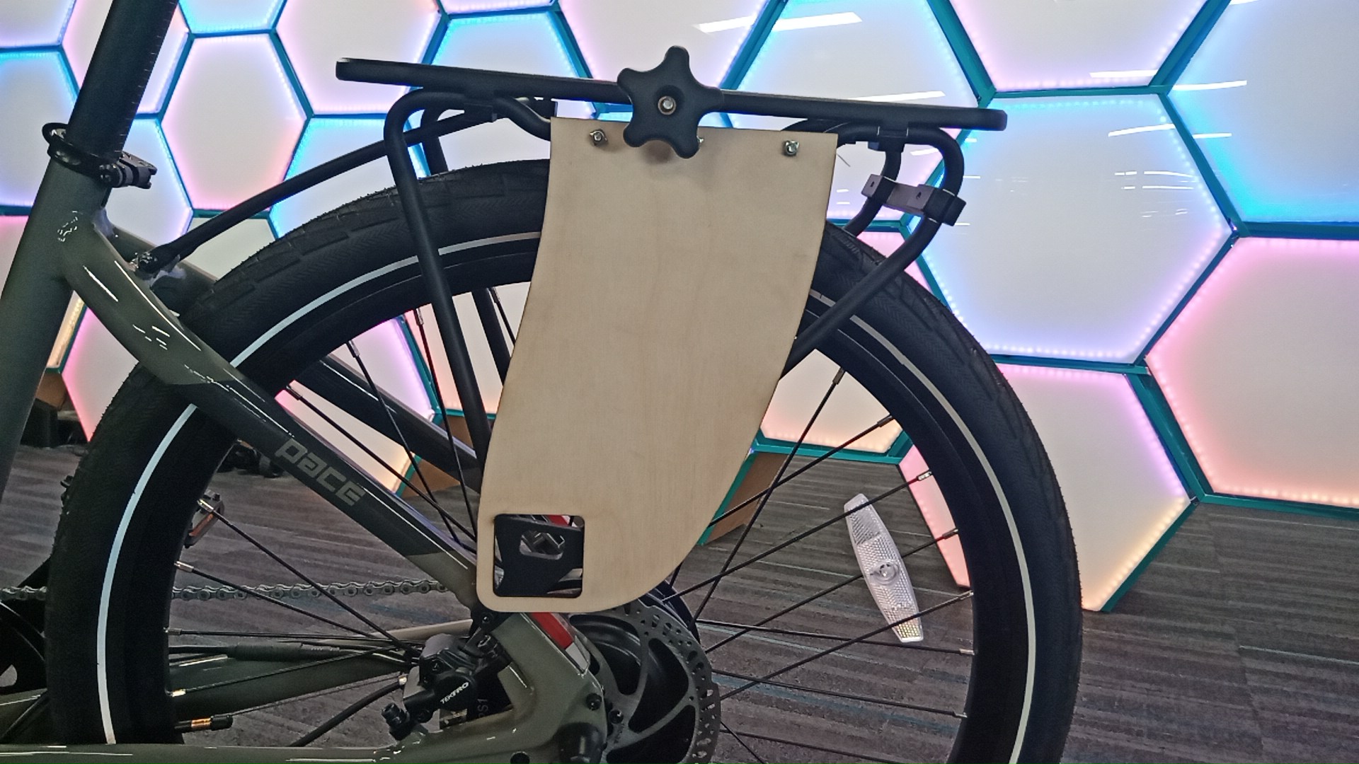Plywood prototype mounted on the bike