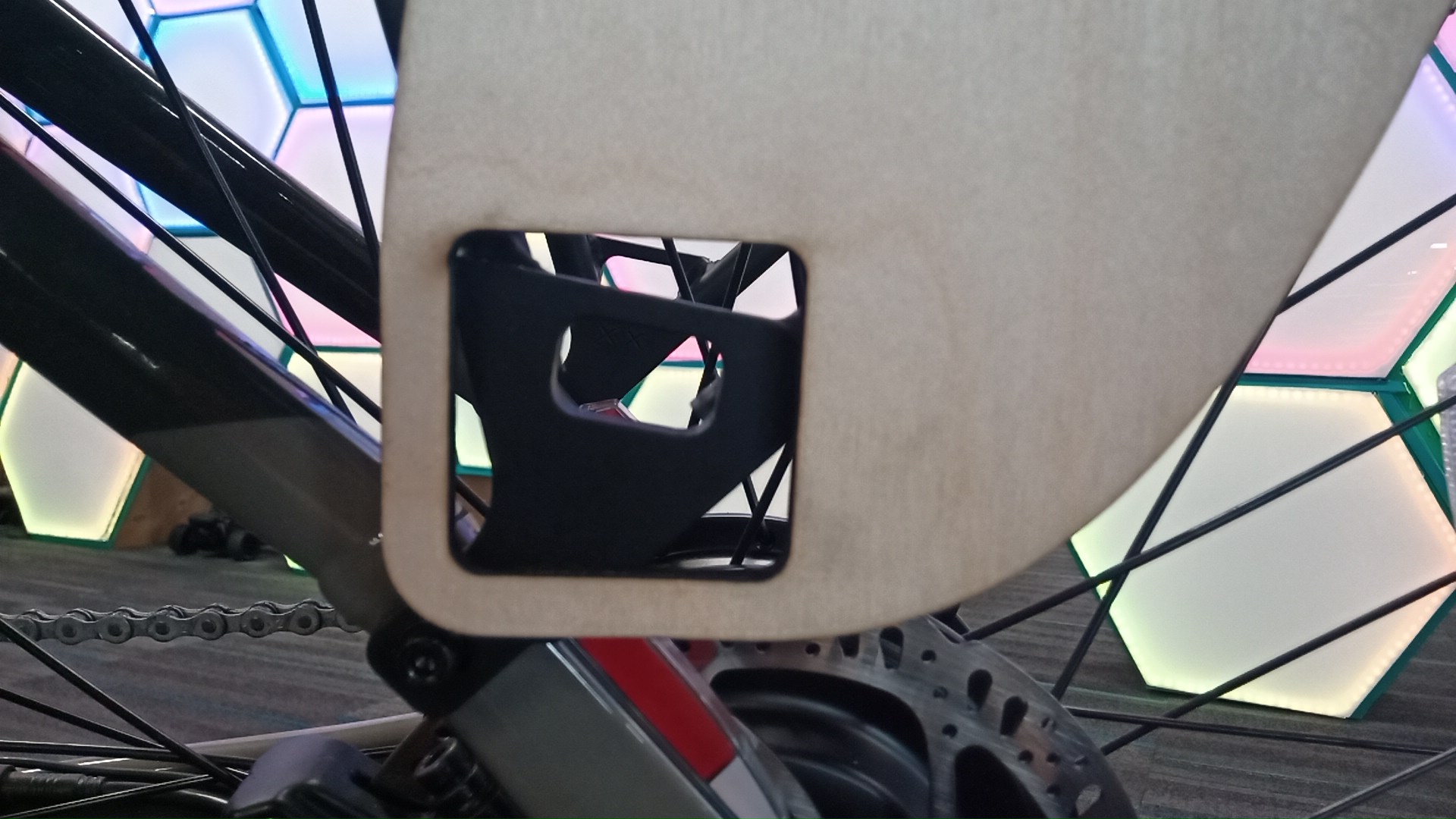 Close-up of cutout clearing lower mounting hardware